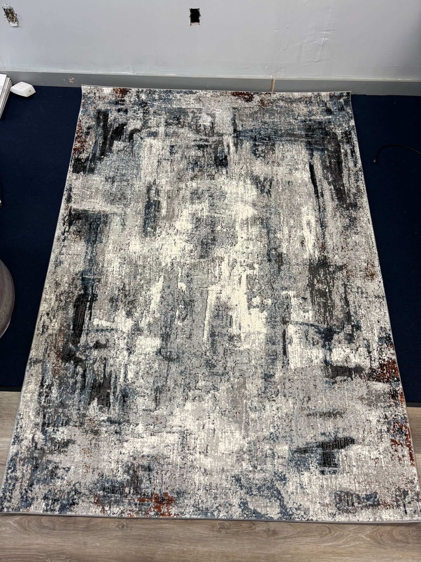 Modern Abstract Grey Area Rug – Distressed Texture with White & Rust Accents
