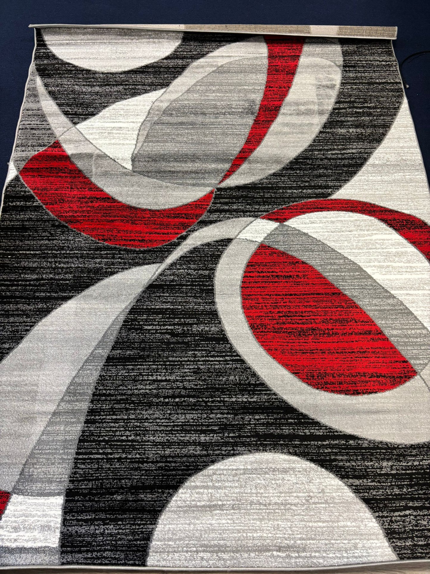 Red & Black Modern Swirl Area Rug – Eye-Catching Abstract Carpet