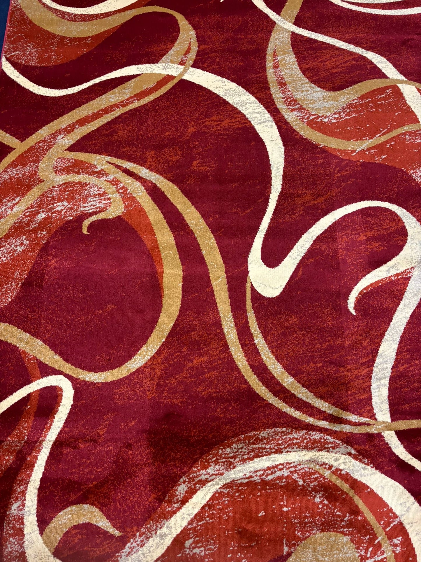 Red Abstract Swirl Area Rug – Modern Curvy Pattern in Gold & Cream