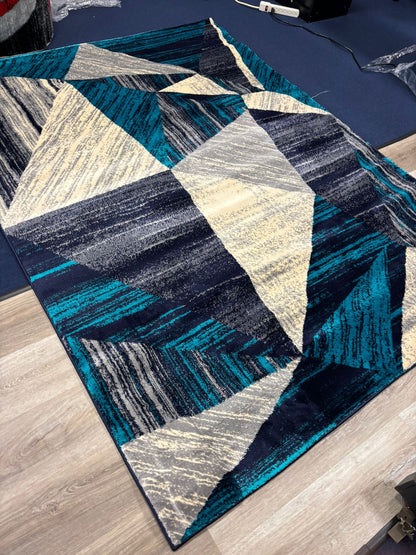 Geometric Blue Area Rug – Modern Triangles in Navy, Grey & Cream